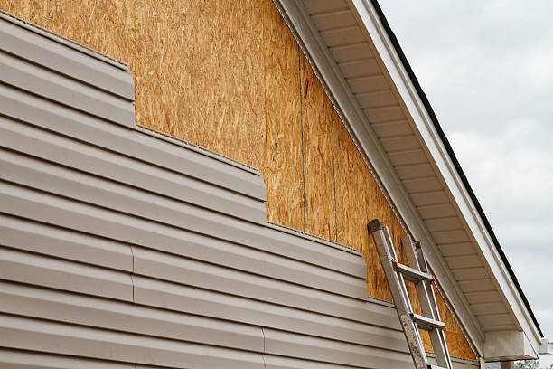 Professional Siding Installation technician working in Gambier, OH